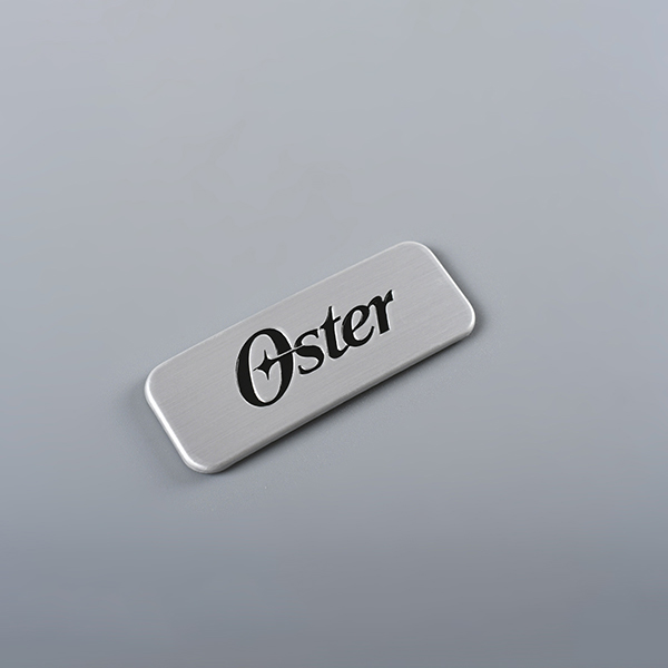 Tags de metal com logotipo gravado